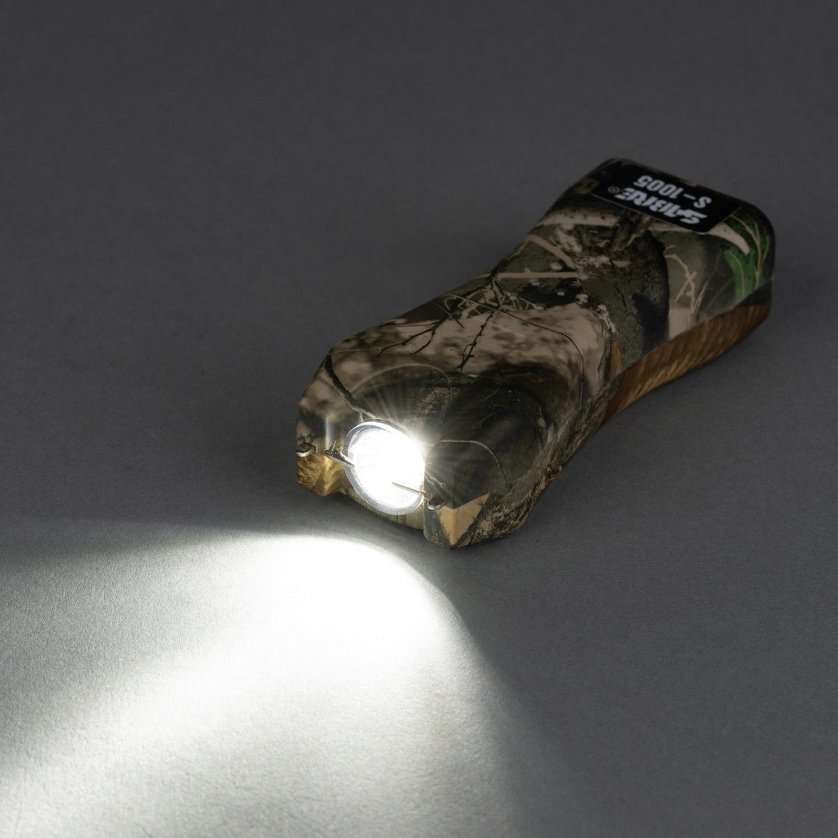 SABRE 2-in-1 Camo Stun Gun and Flashlight with Black Belt Holster